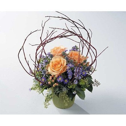 Lavander Roses, Purple and White Carnations in Wicker Basket with Ribbon Sympathy Basket