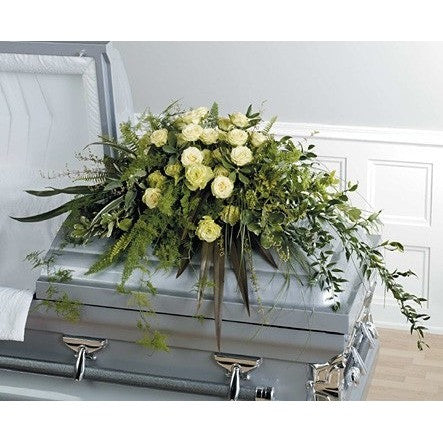 Red carnations full couch sympathy casket