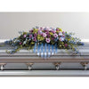 Blue, Lavander and Purple Flowers with Hanging Ribbons Sympathy Casket Spray - Flowers by Pouparina