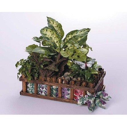 Green Planter with Blooming Plants