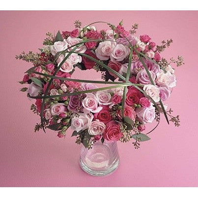 Celestial Beauty: A Graceful Roses Sympathy Arrangement with Urn